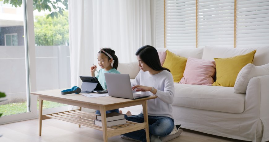 Mother Working on Her Laptop